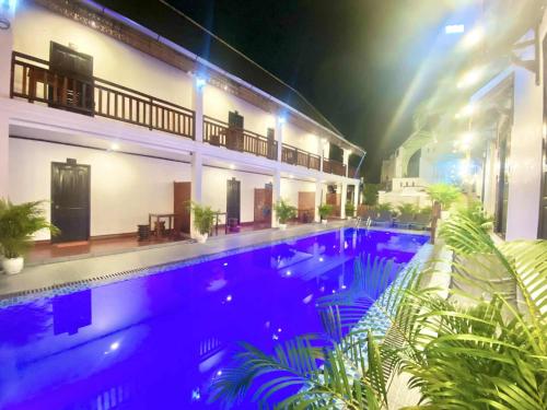 Πισίνα στο ή κοντά στο Luang Prabang Pavilion Hotel & Travel