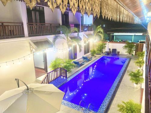 Πισίνα στο ή κοντά στο Luang Prabang Pavilion Hotel & Travel