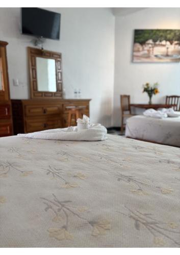 Cama o camas de una habitación en Hotel Fiesta Palmar
