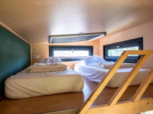 Una cama o camas en una habitación de Holiday home in Scherpenzeel