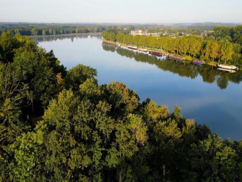 an aerial view of a river with trees at Rooftop Retreat with Sauna in Antoing