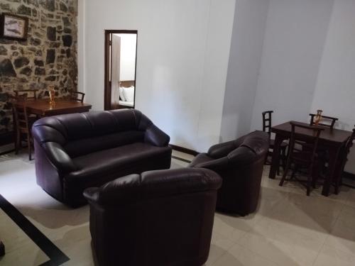 Χώρος καθιστικού στο Green Holiday Inn