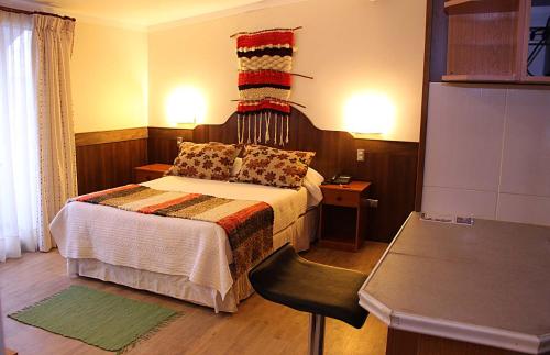 Ένα δωμάτιο στο Hotel Rucaitue