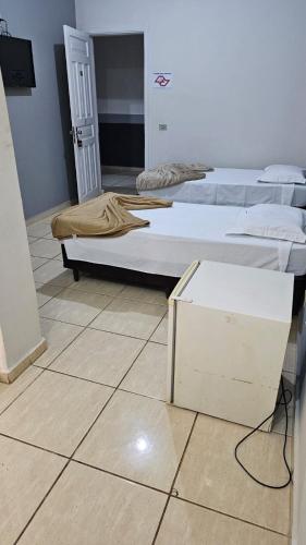 Katil atau katil-katil dalam bilik di Nômade Hotel