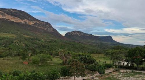 a view of a valley with mountains in the background at Pousada Mont Hebrom in Ibicoara