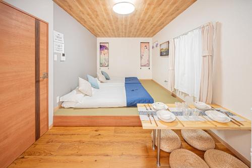 Postel nebo postele na pokoji v ubytování 70-33 駒込駅东口2分 2-4人丨2 minutes from Komagome Station 2-4 people