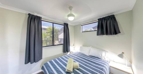 Ένα ή περισσότερα κρεβάτια σε δωμάτιο στο BIG4 Bunbury Riverside Holiday Park