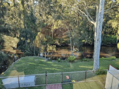 a view of a river from a house at Sanctuary Lodge - 5BR waterfront country getaway in Sanctuary Point