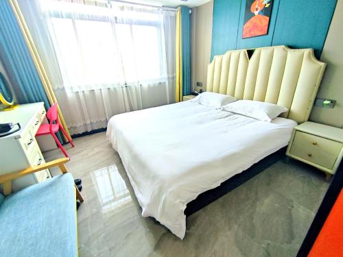 Yiwu Jun'an Hotelにあるベッド