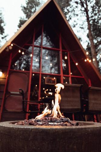 a bird statue in front of a house at Idyllcreek From Sunset Mag - Hottubwalk To Town! in Idyllwild
