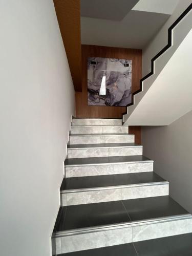 a stair case in a building with concrete steps at Apartamentos Shalama in Ipiales