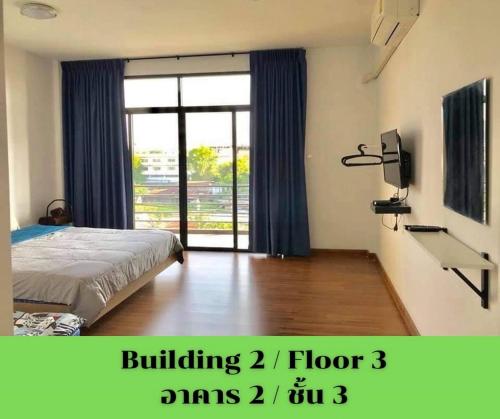 Katil atau katil-katil dalam bilik di SLEEPY-Homey Don Mueang Airport Hostel