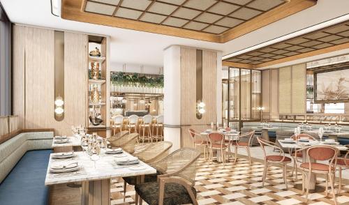 a rendering of a restaurant with tables and chairs at InterContinental Bangkok Sukhumvit by IHG in Bangkok
