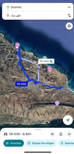 a map of a river on a cell phone at Villa Sounine Rafraf in Bizerte