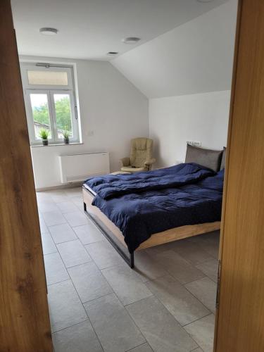 Un ou plusieurs lits dans un hébergement de l'établissement Kranj Leisure Apartment