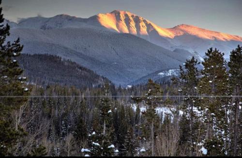 a view of a mountain with a snow covered mountain at 10 min to Resort! Amazing Views & Sauna! in Winter Park