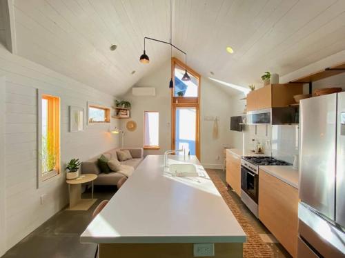 a kitchen with a white counter top in a room at Private Oasis! Cozy & Close to Everything! in Portland