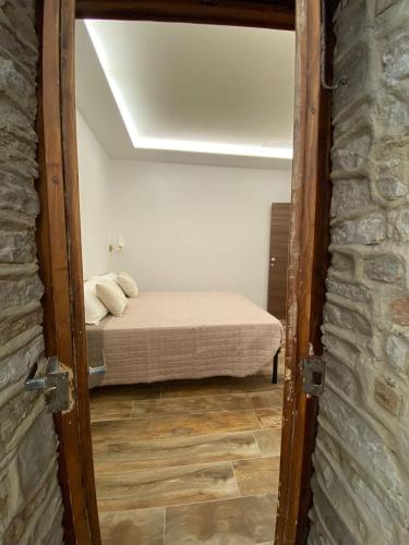 Letto o letti in una camera di Dimora San Valentino