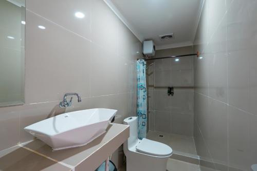 Ένα μπάνιο στο Bella Belly Cottage By Bali Cabin