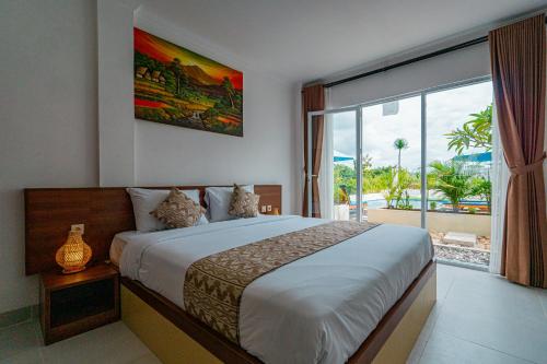 Ένα ή περισσότερα κρεβάτια σε δωμάτιο στο Bella Belly Cottage By Bali Cabin