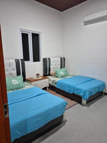 Postel nebo postele na pokoji v ubytování Hotel daundaun