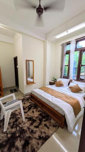 Ένα ή περισσότερα κρεβάτια σε δωμάτιο στο Accomoon hillside homes
