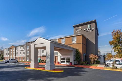 a front view of a hotel with a parking lot at MainStay Suites Lebanon - Nashville Area in Lebanon