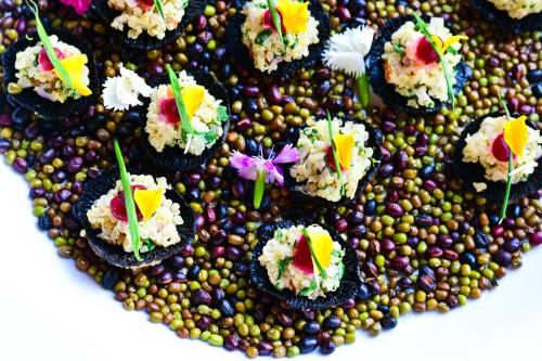 a group of cupcakes with flowers on top at Bertam Wellness Spa & Villas - A Member of Small Luxury Hotels of the World in Kepala Batas