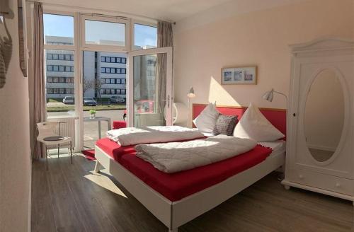 Postel nebo postele na pokoji v ubytování Am Rundsteg 3