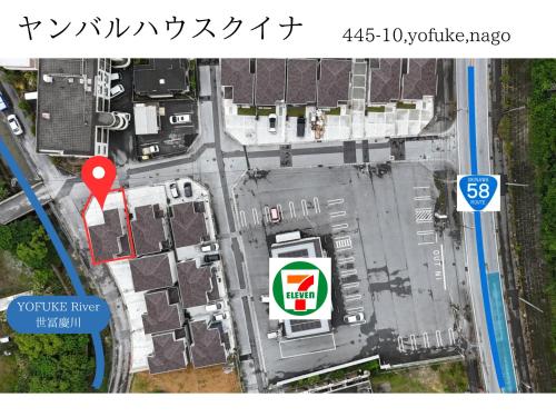 a map of a parking lot with a red marker at ヤンバルハウスクイナ in Nago