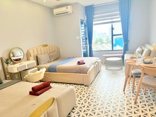 Ruang duduk di Stay With Me Saigon Apartment - Rivergate Building