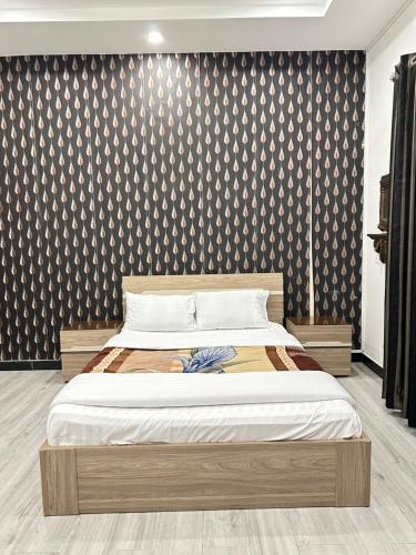 Postel nebo postele na pokoji v ubytování Kaghan Lodge