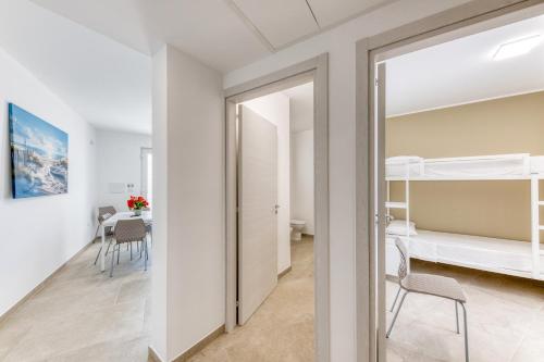 Postel nebo postele na pokoji v ubytování Residence Fronte Mare