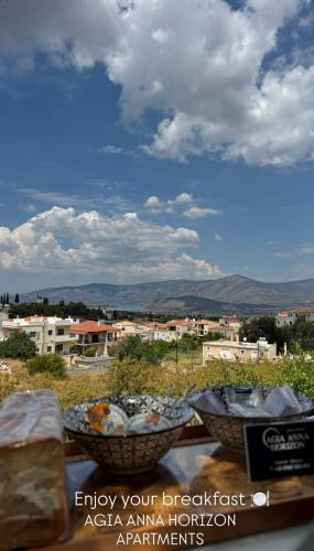 a group of bowls sitting on top of a table at Agia Anna Horizon in Kranidi