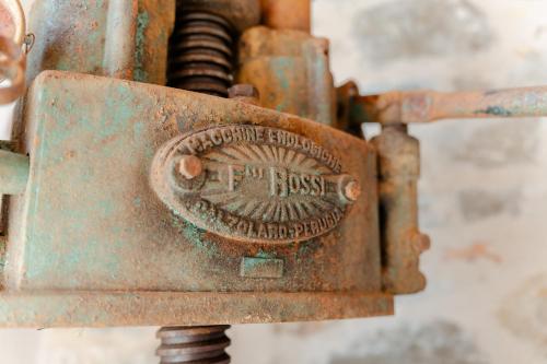 an old rusted object with the brookfield burst on it at Tenuta Alela in Figline Valdarno