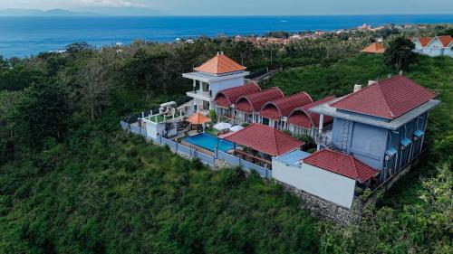 an aerial view of a house with red roof at Kaylas Hill in Nusa Penida