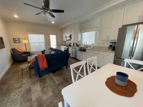a kitchen and living room with a blue couch at Beautiful Rental Just North Of Durango in Hermosa