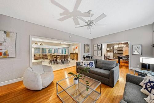 a living room with a couch and a table at Large home king bed by Dream Vacation unit BH in Fort Lauderdale