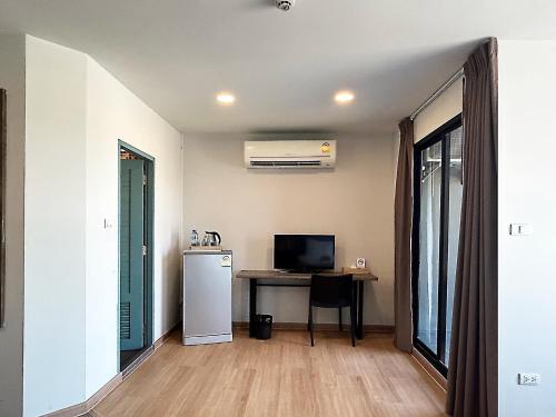 TV a/nebo společenská místnost v ubytování Suntria Hotel Pattaya