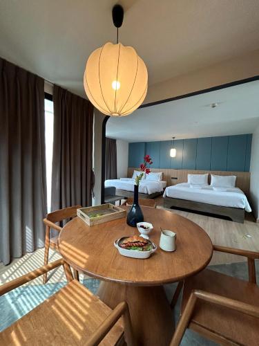 Postel nebo postele na pokoji v ubytování Suntria Hotel Pattaya