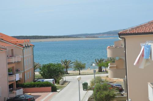 a view of the water from the apartment at Apartments Teami in Povljana