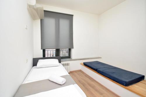 Postel nebo postele na pokoji v ubytování Wanderlust Guest House Inn Northern Avenue