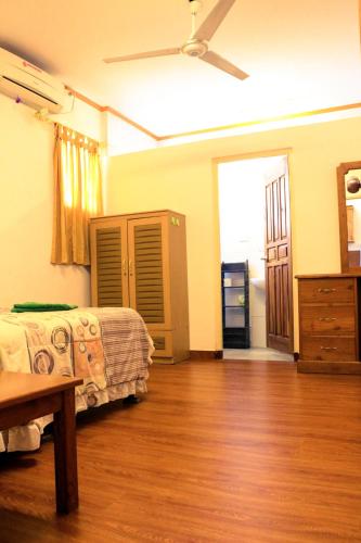 Postel nebo postele na pokoji v ubytování Timor Lodge