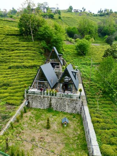 an aerial view of a house on a hill at Ruby Rize Bungalov in Pazar