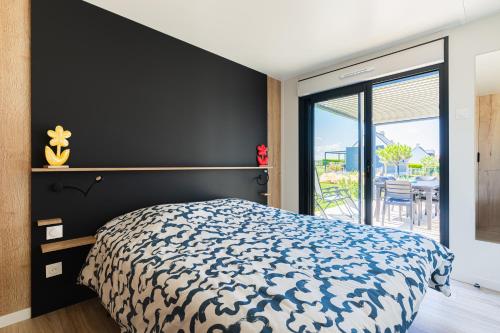 Ένα ή περισσότερα κρεβάτια σε δωμάτιο στο Chalet Gold - 5min à Pied de la Plage