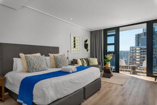 En eller flere senge i et værelse på Skyline Studio in the clouds