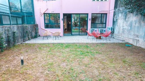 Κήπος έξω από το Coliving moderno com lindo jardim