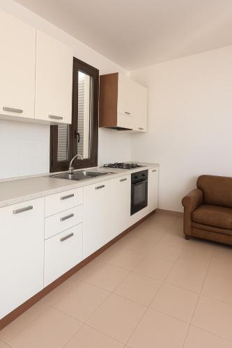 Kuchyň nebo kuchyňský kout v ubytování Almaré Tropea Guest House