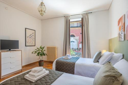 Ένα ή περισσότερα κρεβάτια σε δωμάτιο στο Casa La Rossa