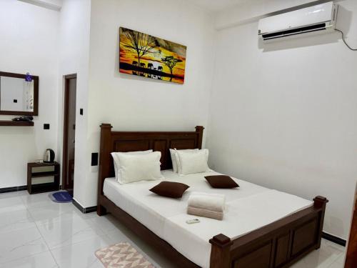 Una cama o camas en una habitación de Hotel Awaken